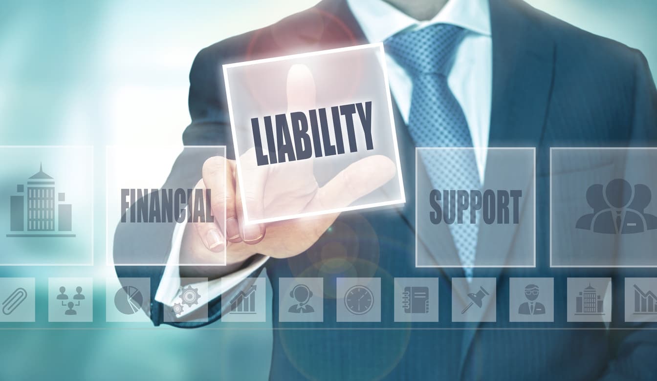 A businessman pressing a virtual liability button represents commercial liability in Florida