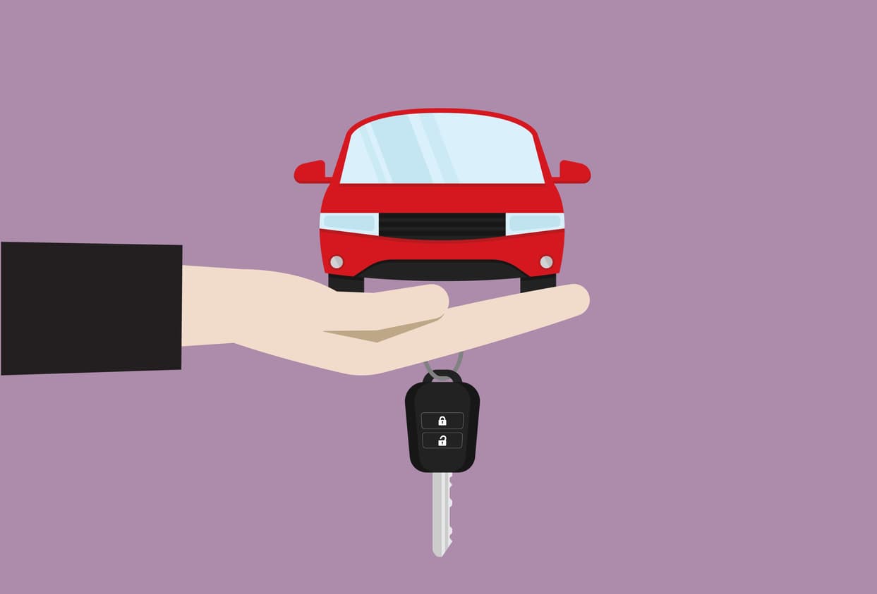 An illustration of a hand holding a car and a key signifies commercial auto insurance in Florida