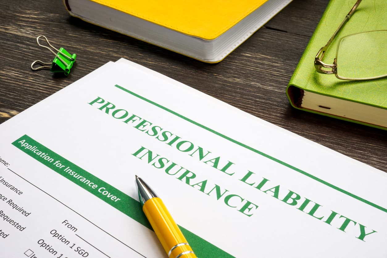 professional liability insurance form with yellow pen