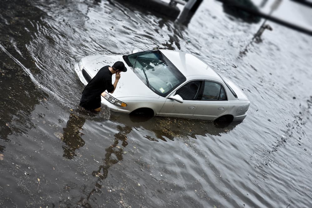 A Car submerged in a flood during hurricane season